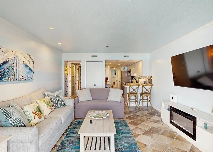 Charming Waterfront With Pool Access And Private Balcony Views Holiday home