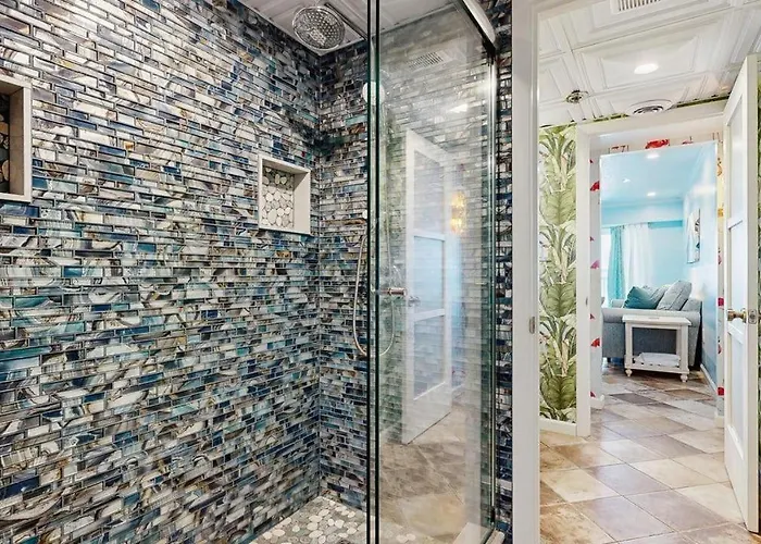 Charming Waterfront With Pool Access And Private Balcony Views