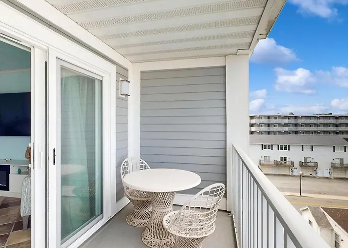 Charming Waterfront With Pool Access And Private Balcony Views